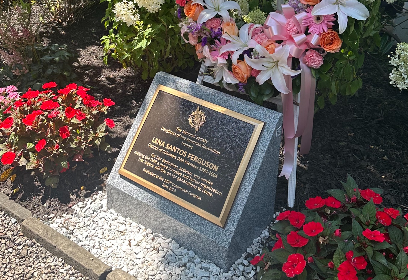 Memorial plaque honoring Lena Santos Ferguson in the garden beside DAR Constitution Hall